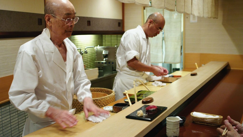 Jiro Ono, left, and Yoshikazu Ono in the documentary “Jiro Dreams of Sushi.” Credit...Magnolia Pictures